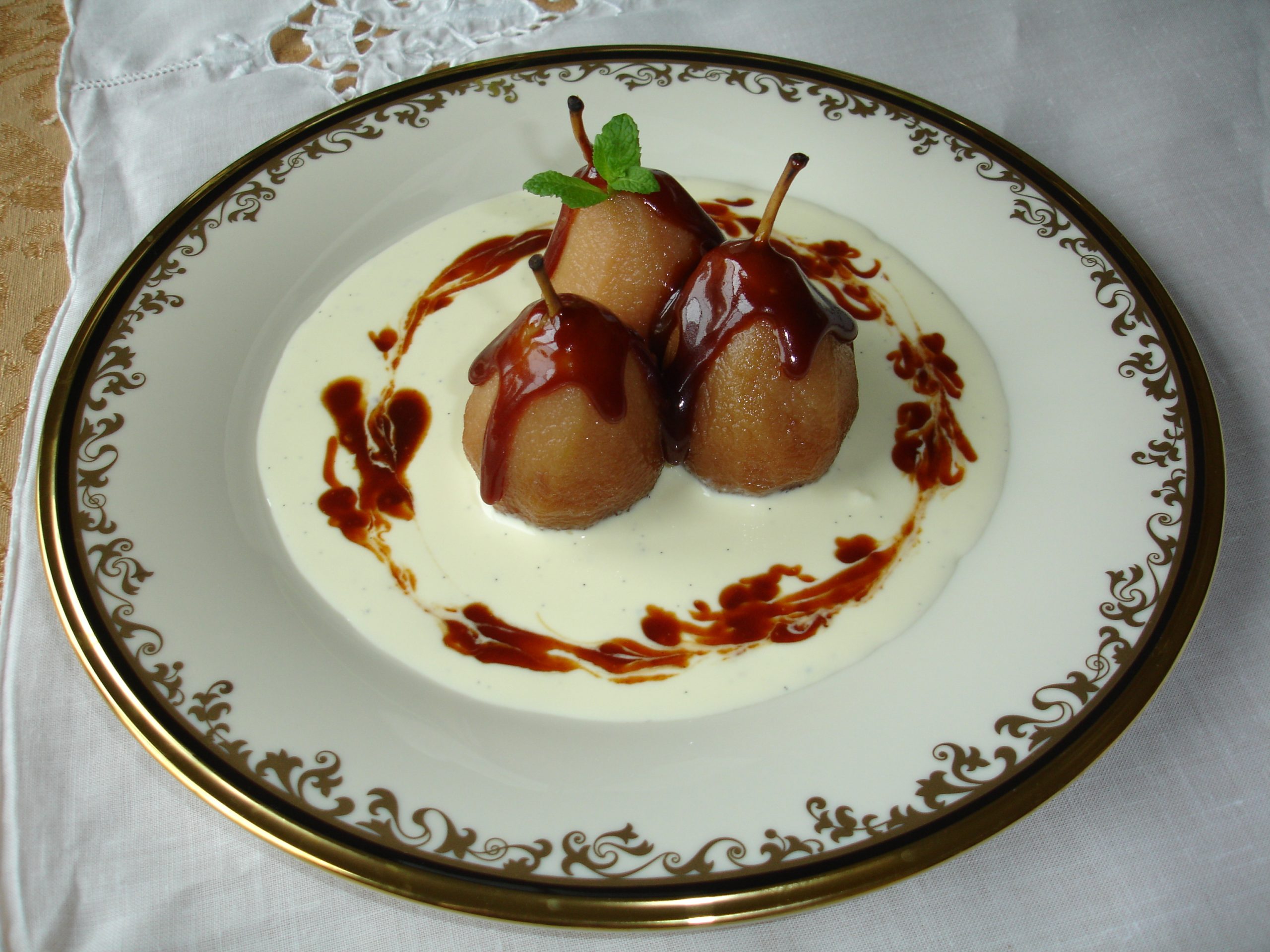 Poached Pears with Ginger Crème Anglaise and Caramel Sauces